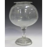 A glass leech jar, late 18th/early 19th century, the large bulbous bowl with everted rim, raised