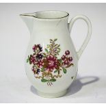 A Worcester sparrow beak cream jug, circa 1775, painted in famille rose style with a bouquet of