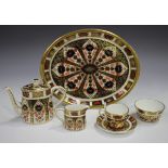 A Royal Crown Derby 1128 Imari pattern miniature tea set, comprising teapot and cover, milk jug,