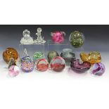 A mixed group of decorative glassware, including four Caithness paperweights, a Mdina paperweight