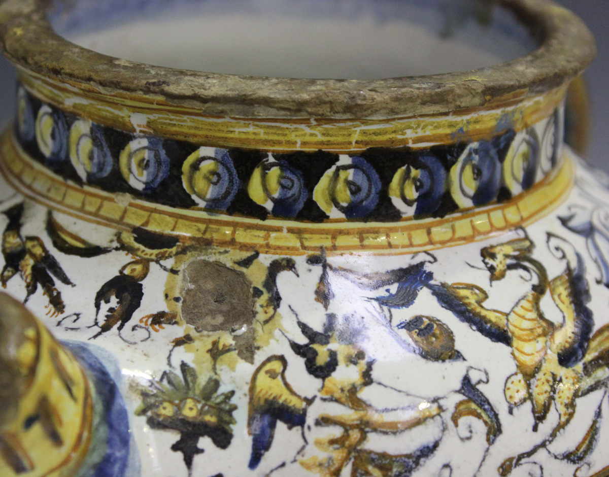 An Italian maiolica wet drug jar, probably Deruta, 17th century, the ovoid body painted to the front - Image 2 of 9