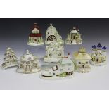 Nine Coalport pastille burners, 20th century, comprising Pagoda House, The Parasol House, The