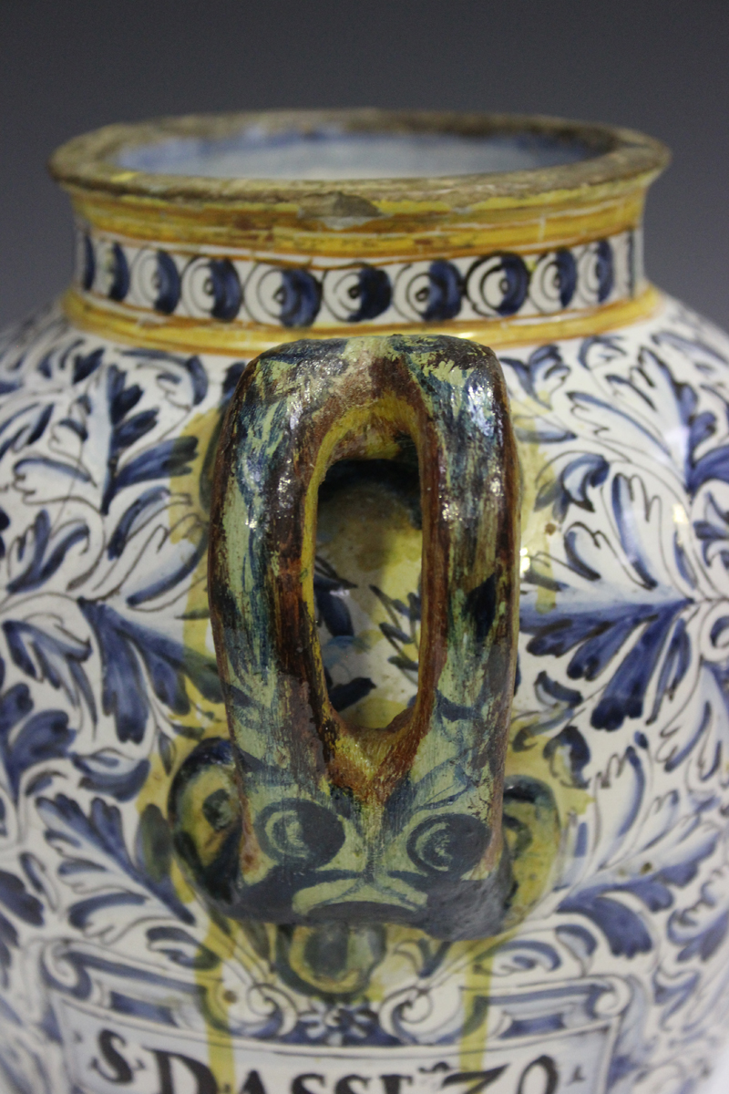 An Italian maiolica wet drug jar, probably Deruta, 17th century, the ovoid body painted to the front - Image 6 of 9