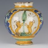 A Sicilian maiolica bombola, Caltagirone, 18th century, the rounded body painted with a pair of