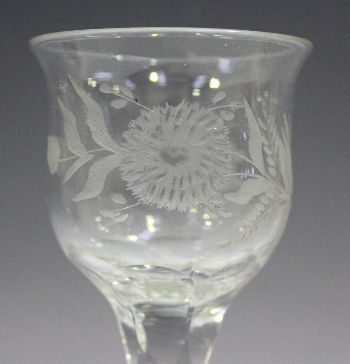 A faceted stem engraved glass, late 18th century, the lipped ogee bowl engraved with flowers and - Image 3 of 3