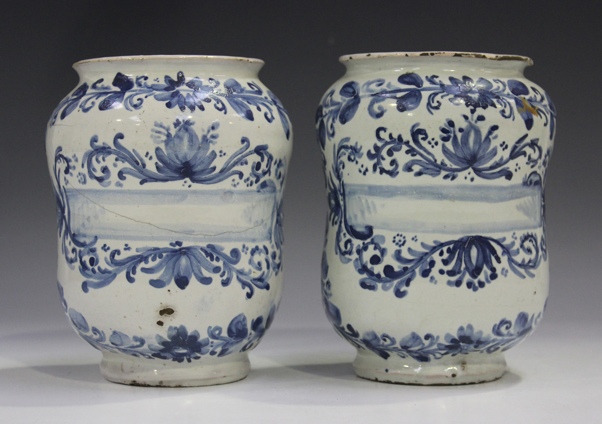 A pair of Italian maiolica albarelli, probably Savona or Florence, 18th century, of unusual squat