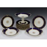 A Coalport dessert service, early 20th century, the cobalt blue ground rims with gilt overlaid and