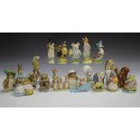 Twenty-one Beswick Beatrix Potter figures, comprising Little Pig Robinson with mark BP-2, Squirrel