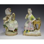 A pair of Vienna porcelain figures, 19th century, each modelled as a seated lady, in the style of