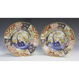 A pair of Coalport Rock and Tree Japan pattern soup plates, circa 1810, with simple blossom