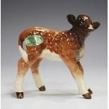 A Beswick dairy shorthorn calf, No. 1406C, height 7.6cm.Buyer’s Premium 29.4% (including VAT @