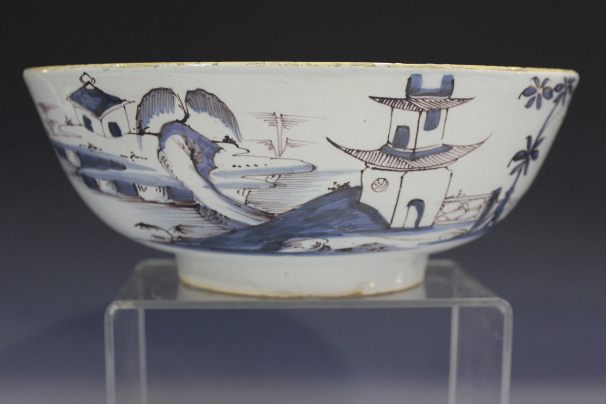 An English Delft circular bowl, London or Bristol, circa 1760, the exterior painted in manganese and - Image 14 of 14