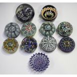 Sixteen assorted glass paperweights, 20th century, including Scottish millefiori examples by
