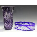 Two pieces of flashed cut glass, 20th century, comprising an oval bowl in blue with stylized