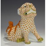 A Herend porcelain dog of Fo with iron red scale decoration, impressed and printed marks to base,
