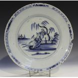 An English Delft charger, probably London or Bristol, circa 1770, painted in blue with a female