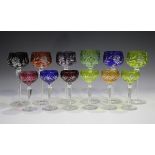 A small group of flashed or coloured glasses, 20th century, including a harlequin set of six hock