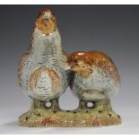 A pair of Beswick partridges, No. 2064, height 14.5cm.Buyer’s Premium 29.4% (including VAT @ 20%) of