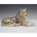 A Royal Copenhagen model of a Lioness, circa 1975, designed by Lauritz Jensen, printed and painted