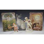 Two Royal Worcester porcelain figures, comprising December, No. 3458 and Snowball, together with a