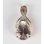 A 9ct gold, morganite and diamond pendant, claw set with a pear shaped morganite with a diamond