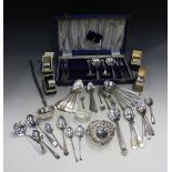 A small collection of silver cutlery, five silver napkin rings, a silver bonbon dish, a silver punch