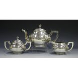 A late 19th/early 20th century Chinese silver three-piece tea set, comprising teapot, milk jug and