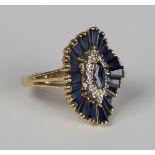 An 18ct gold, sapphire and diamond marquise shaped cluster ring, mounted with a marquise cut