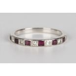 A ruby and diamond half-hoop eternity ring, mounted with six square cut rubies alternating with five