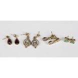 A pair of gold and emerald three stone earstuds, a pair of 9ct gold, amethyst and diamond pendant