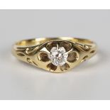 A gold and diamond single stone ring, mounted with a cushion cut diamond, detailed '18ct', weight