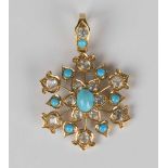 A gold, turquoise and colourless gem set pendant in a hexagonal openwork design with a flowerhead at
