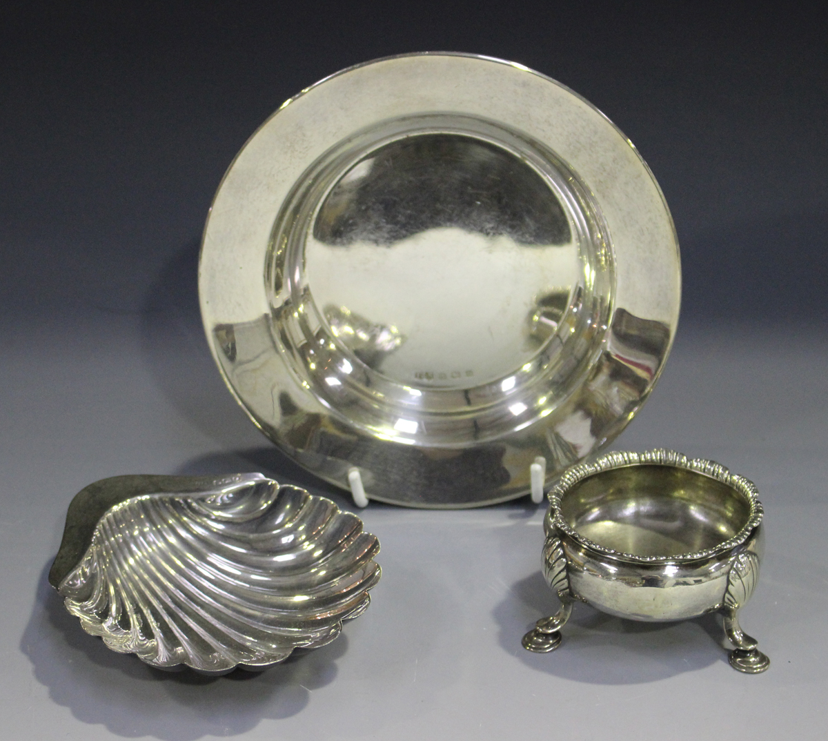 A late Victorian silver butter shell, on three shell feet, Sheffield 1892 by Atkin Brothers,