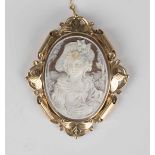 A 9ct gold mounted oval shell cameo brooch, designed as a portrait of a lady, in a Victorian