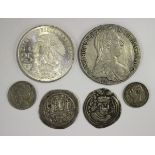 A collection of foreign coins, including a Sasanian drachm, another Sasanian coin, a Netherlands