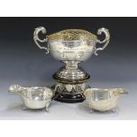 An Edwardian silver two-handled trophy cup with flying scroll handles, Sheffield 1909, height 15.5cm