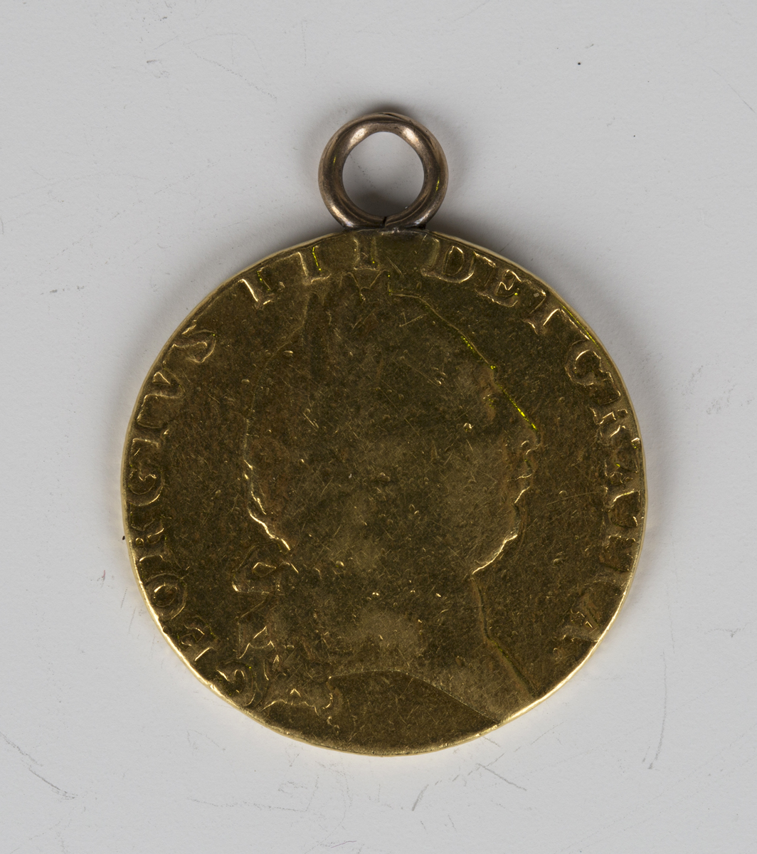 A George III spade guinea 1791, mounted as a pendant.Buyer’s Premium 29.4% (including VAT @ 20%)