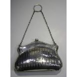 A George V silver purse with engine turned banding and leather lined interior, Birmingham 1919 by