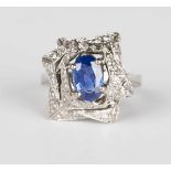 An Andrew Grima platinum, sapphire and diamond cluster ring, circa 1975, in a pierced geometric