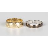 A 9ct gold wedding ring with slanting decoration, ring size approx R, and another 9ct gold wedding