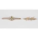 A gold and seed pearl bar brooch with two swallow motifs, width 3.2cm, and a gold, peridot and