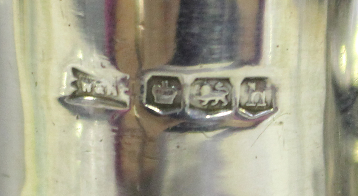 A George V silver three-piece condiment set of faceted baluster form, comprising salt, pepper caster - Image 2 of 5