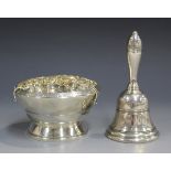 An Elizabeth II silver bell with turned handle, Birmingham 1969, height 11.1cm, together with a