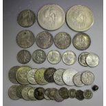 A collection of mostly foreign coins, including a Chinese trade dollar 1929, two restruck Maria