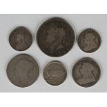 A George IV crown 1821 and four Victorian silver coins, total weight 62.2g, together with an Ireland