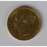 A Victoria Young Head shield back sovereign 1864.Buyer’s Premium 29.4% (including VAT @ 20%) of