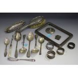 A small group of silver items, including a George V silver curved rectangular photograph frame