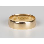 An 18ct gold wide band wedding ring, Birmingham 1926, weight 5.8g, ring size approx P.Buyer’s