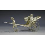 An early 20th century Chinese white metal novelty condiment stand in the form of a rickshaw,