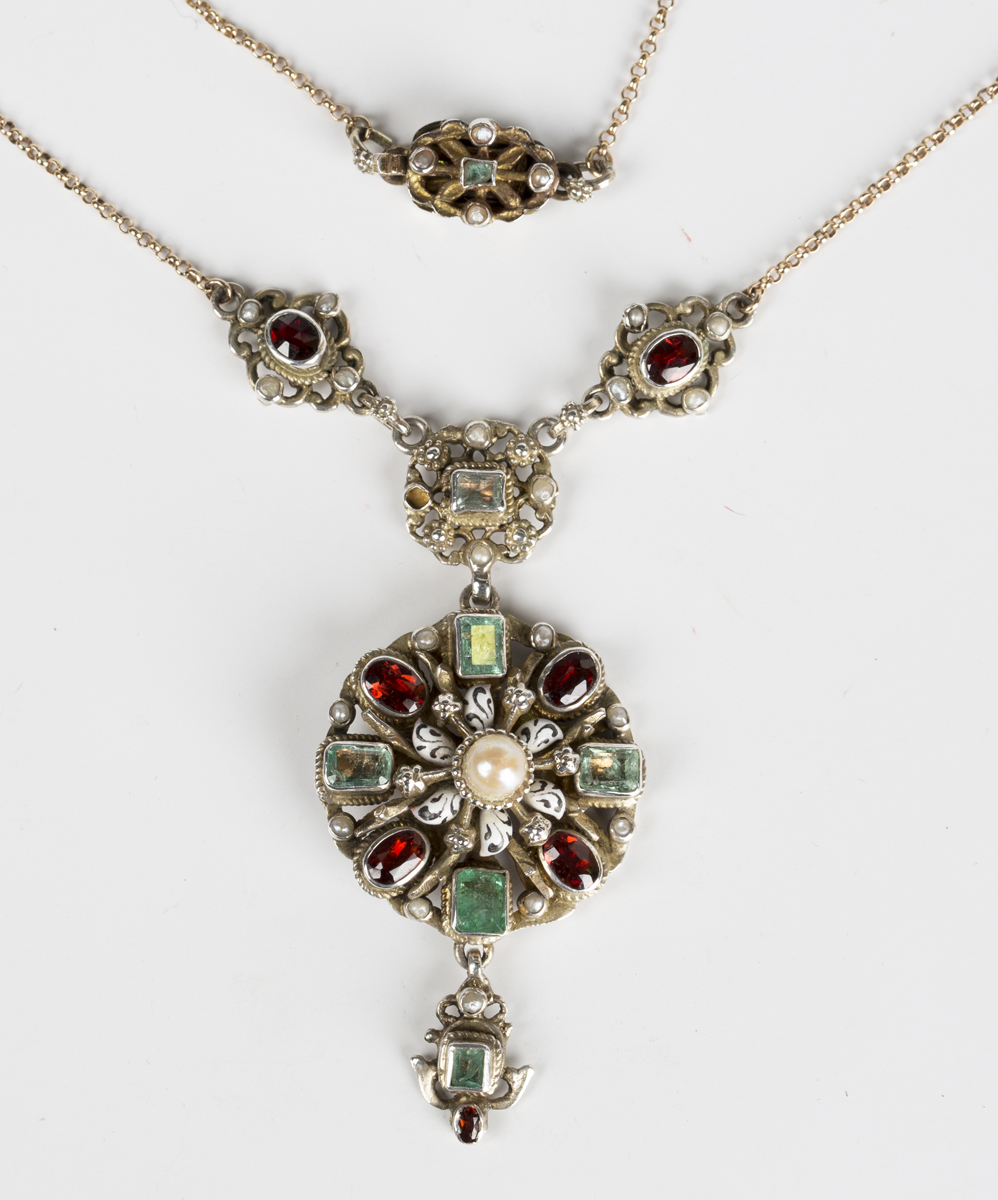 A foil backed garnet, foil backed emerald, cultured pearl and enamelled pendant necklace, probably